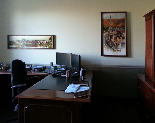 Framed prints of  Cambridge on the wall at an office at Gore Mutual Insurance