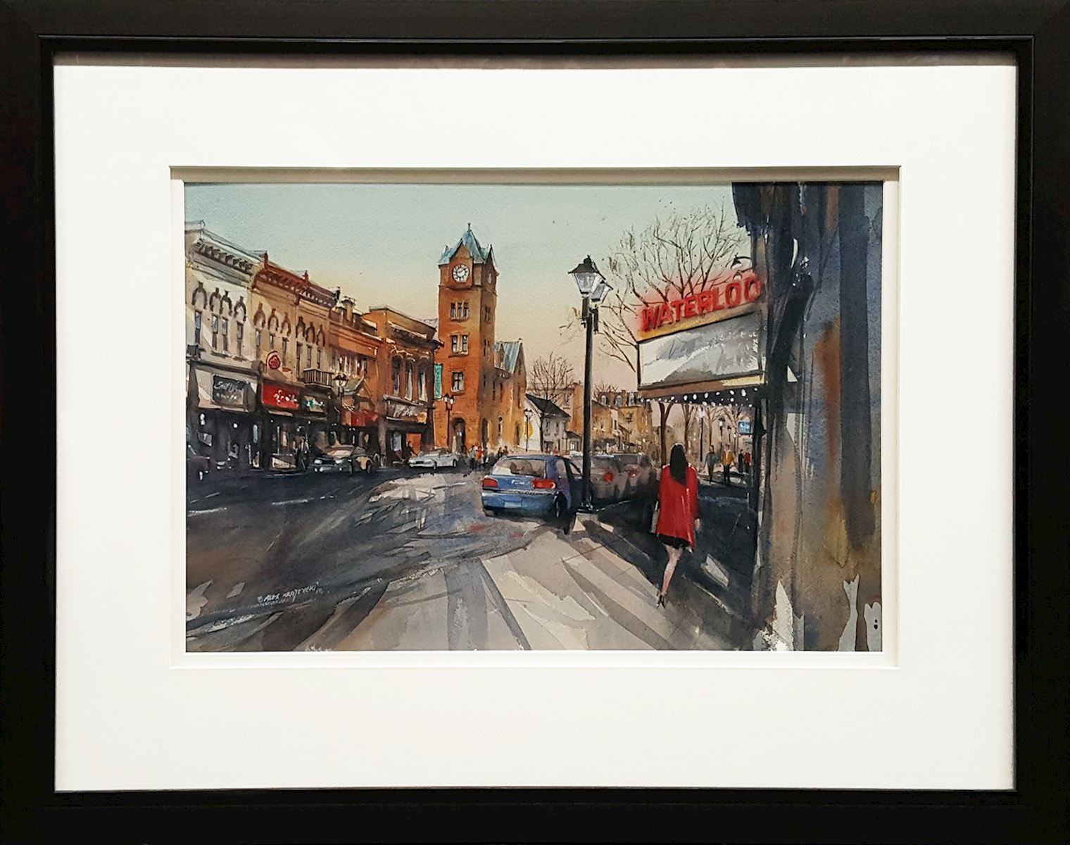 Framed original watercolor painting by Alex Krajewski depicting a street scene of Waterloo, Ontario.