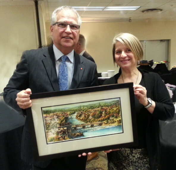 The Honourable Gary Goodyear, Minister of State, presented by Cambridge Chamber of Commerce with  "Cambridge Panorama" by Alex Krajewski 