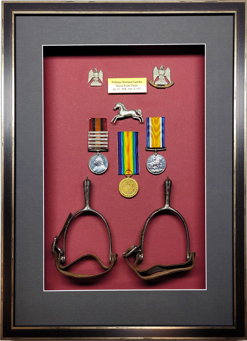Over a 100 year old family war memorabilia royal scots greys cap badge and stirrups framed by krajewski gallery-cambridge-ontario