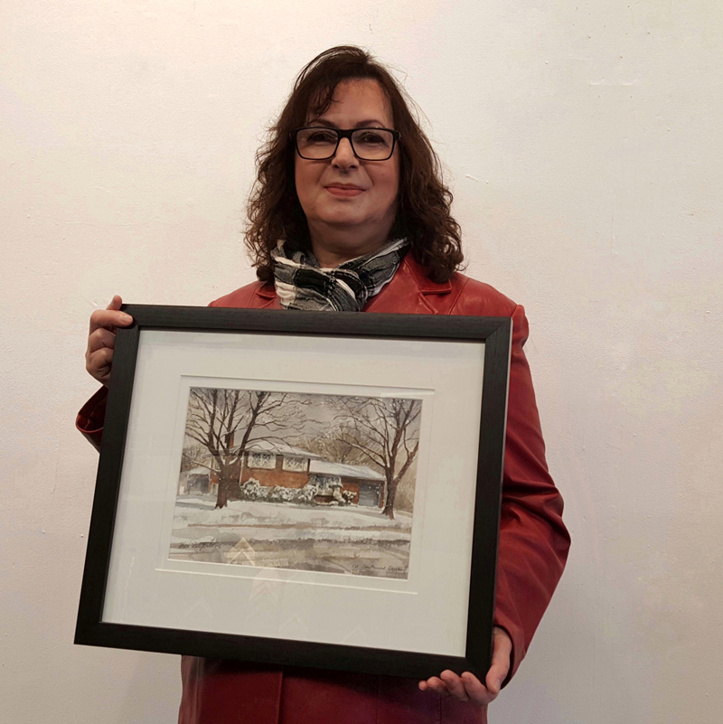 Lucy Schito with the commissioned house portrait painted by Alex Krajewski