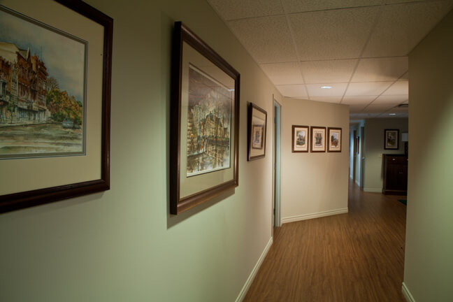 Alex Krajewski's framed prints of Galt in hallway at Transchem company in Cambridge Ontario